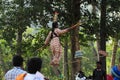 Indian girl performs street acrobatics during the Thaipusam festival