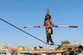 Indian girl performs street acrobatics