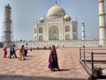 Indian Girl  standing in front of The Taaj Mahal which is located in Aagra Royalty Free Stock Photo