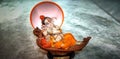 Indian god ganesha in layng position