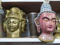 Budha and Shive God statues in Indian antique shop.