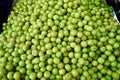 Indian gooseberry selling in market, and healthy indian gooseberry called AMLA in hindi language of india, Indian