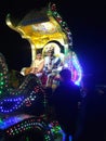 Indian groom on horse cart