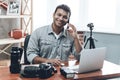 Indian Happy Young Man Photographer Work from Home Royalty Free Stock Photo