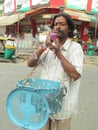 Indian Hawker selling Bubble Game