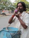 Indian Hawker selling Bubble Game