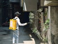 Indian Health Worker Spraying Disinfectant