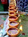 Indian hindhu tample . Prayer . Firing diya