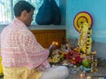 Indian Hindu Brahmin priest worshiping Goddess saraswati.