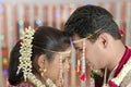 Indian Hindu Bride and Groom looking at each other in maharashtra wedding.