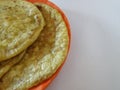 Group of Dal Holige or Obbatta in a Orange Color Plate on white Background