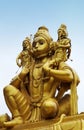 Indian Hindu god Hanuman carrying Rama and Lakshmana on shoulders statue in a temple