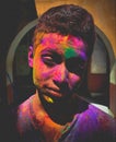 Indian Holi festival bautiful colours on face of boy Royalty Free Stock Photo