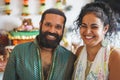 Indian husband and wife smiling in front of the camera - Portrait of happy southern asian couple - Love, ethnic and india`s Royalty Free Stock Photo