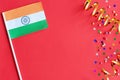 Indian Independence Day. Flag of India on a festive red background. The concept of celebration, patriotism and celebration. Copy Royalty Free Stock Photo