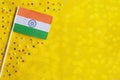 Indian Independence Day. Flag of India on a festive yellow background. The concept of celebration, patriotism and celebration. Royalty Free Stock Photo