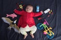 Indian Infant baby sleeping with toys Royalty Free Stock Photo