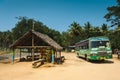 Indian intercity bus stop with goverment transport at parking among palm trees 19 february 2018 Madurai, India Royalty Free Stock Photo