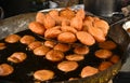 Indian kachori being fried in sweet stall