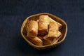 indian khari or kharee or salty Puff Pastry Snacks in wooden bowl