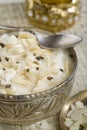 Indian Kheer, rice dessert in a bowl.