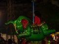 Indian kids enjoying carousel ride in elephant at amusement park Royalty Free Stock Photo