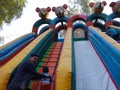 indian kids sliding on slider at fair program in India January 2020 Royalty Free Stock Photo