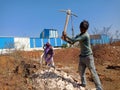 indian labour digging lime soil for construction work in India dec 2019