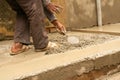 Indian labour plastering using trowel