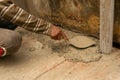 Indian labour plastering using trowel