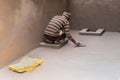 Indian labour plastering using trowel