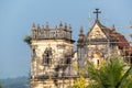 Indian labourers working on the repair and restoration of the ancient Portuguese era Church and