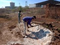 indian labours digging lime soil for construction work in India dec 2019