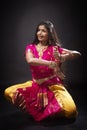 Indian lady performing traditional dance called Bharatnatyam