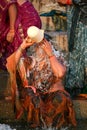 An indian lady washing in the ganges river Royalty Free Stock Photo