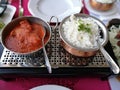 Indian lamb curry and boiled rice bowls. Royalty Free Stock Photo