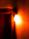 Indian lightning bulb hanging in front of the door Royalty Free Stock Photo