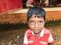 Indian little boy with shy timid expression