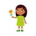 Indian little girl like the pleasant smell from a flower. Fragrance concept.