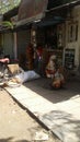 Indian little shop for consumables under shadow of roof