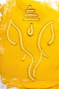 Indian Lord Ganesha ji On the texture of turmeric