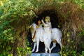 lord krishna with cow and flute under green shelter