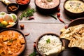Indian lunch or dinner items like dal, paneer butter masala, roti, rice, salad Royalty Free Stock Photo