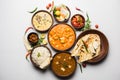 Indian lunch or dinner items like dal, paneer butter masala, roti, rice, salad Royalty Free Stock Photo