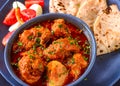 Chicken Curry meal with roti and salad