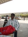 INDIAN MALE AT dubai airport while returning to india