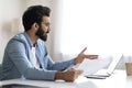 Indian Male Entrepreneur Working With Papers And Laptop At Home Office Royalty Free Stock Photo