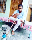 Indian male with hukka and spatcl