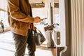 Indian man buying ticket with cellphone at train station Royalty Free Stock Photo