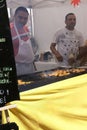 Indian man cooking spicy kebabs
